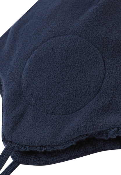 REIMA Mütze mit Bändel <br>Nunavut <br>Gr. 46 - 52 <br>innen hautfreundliches Fleece<br> aussen warme, wasserabweisende Merino-Wolle<br> Windstopper-Membrane im Ohrbereich